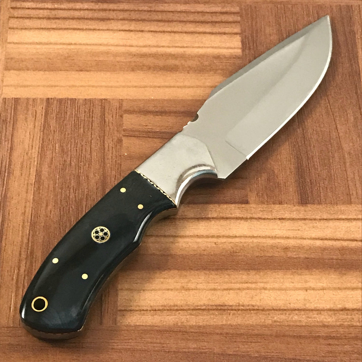 Full tang construction makes for a very solid and well balanced knife. - NB CUTLERY LTD