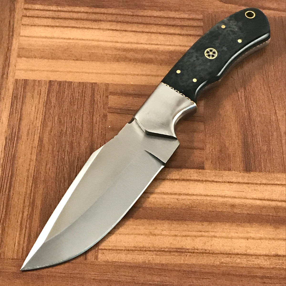 Full tang construction makes for a very solid and well balanced knife. - NB CUTLERY LTD