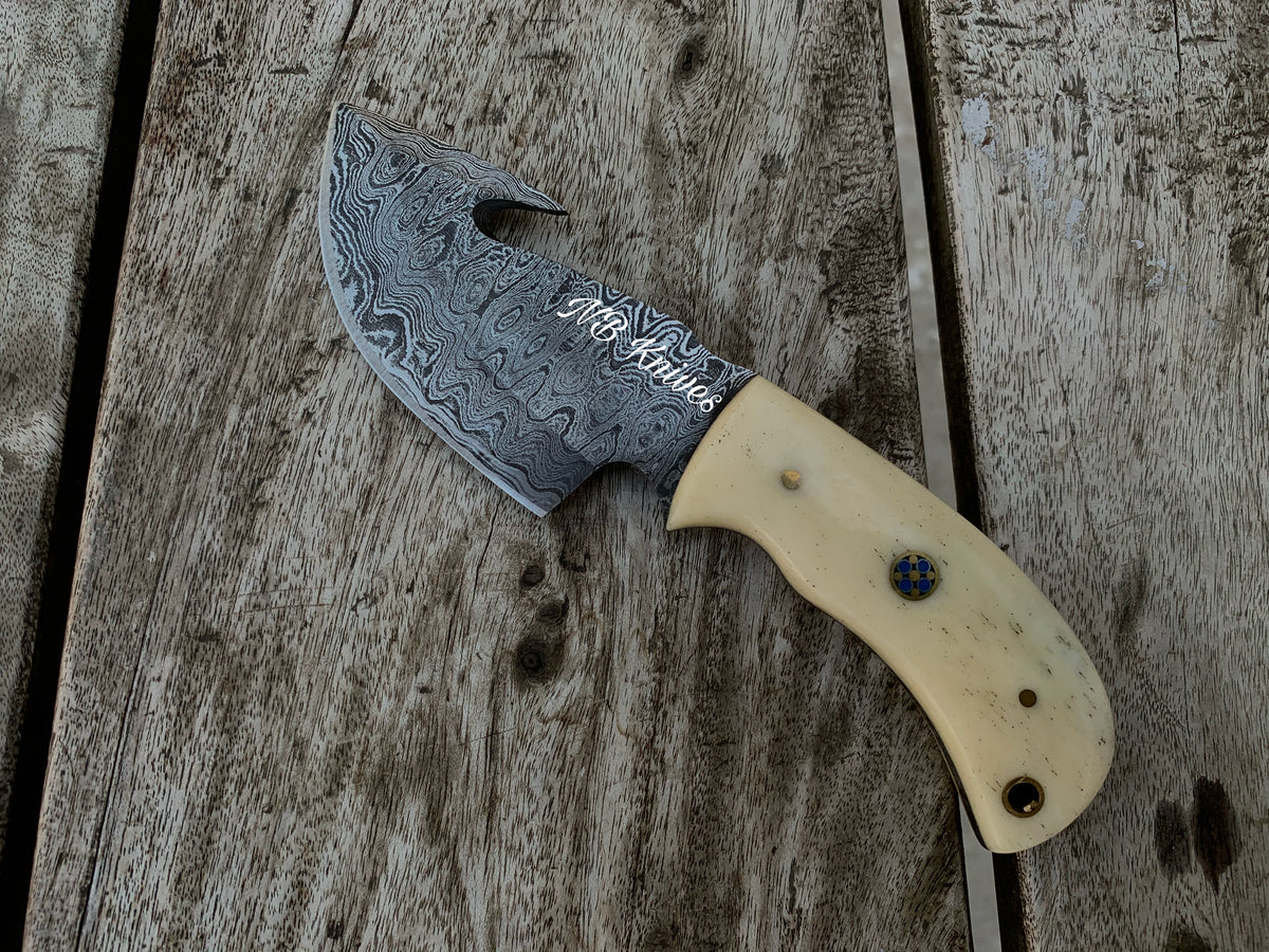 Hand-Forged Damascus Gut Hook Skinner Knife – Camel Bone Handle