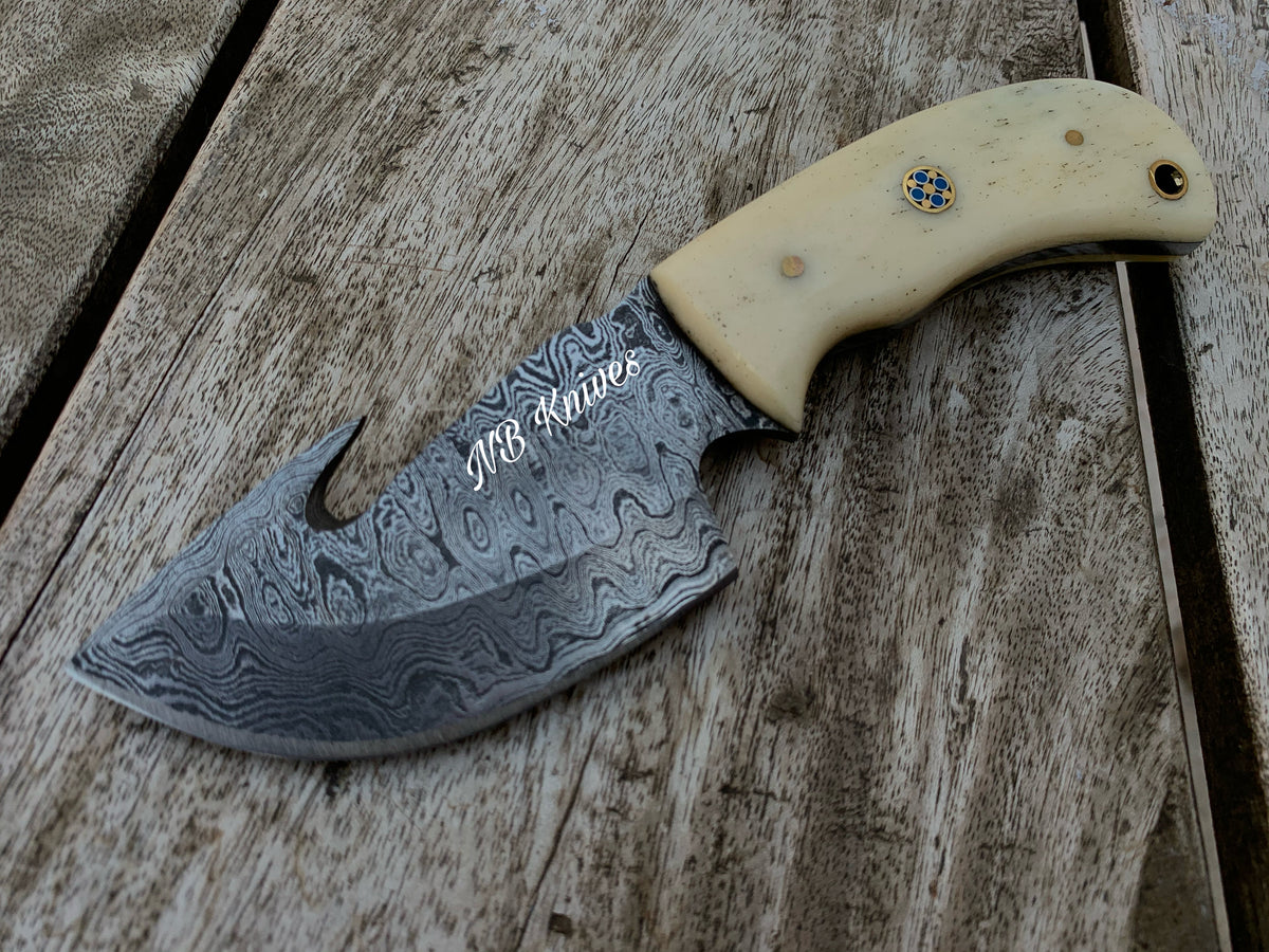 Hand-Forged Damascus Gut Hook Skinner Knife – Camel Bone Handle