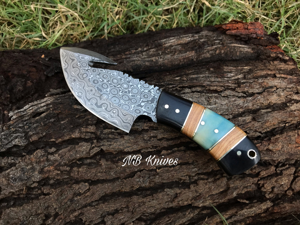 Handcrafted Damascus Guthook Knife Featuring Dyed Bone, Black Horn & Olivewood Handle