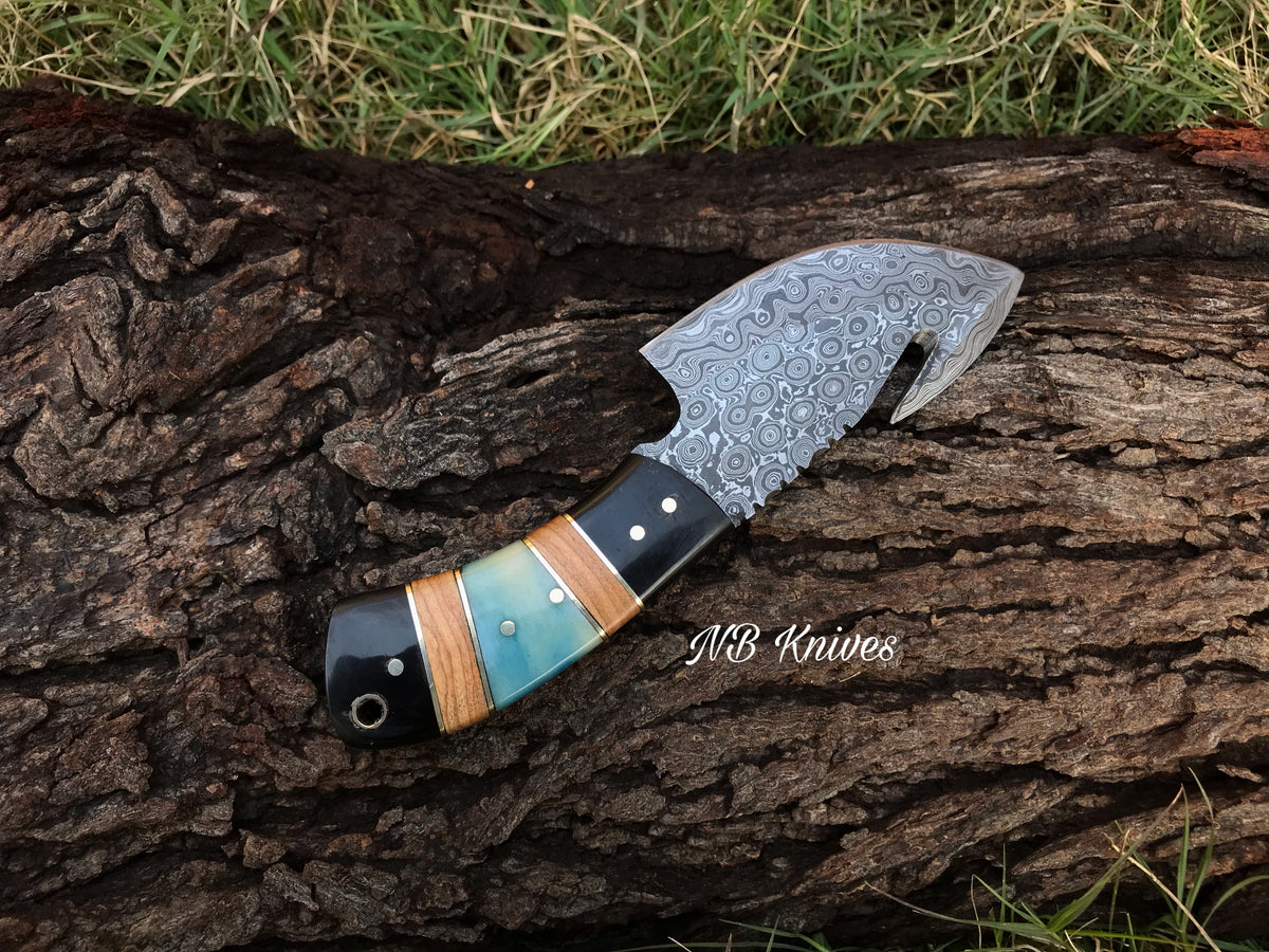 Handcrafted Damascus Guthook Knife Featuring Dyed Bone, Black Horn & Olivewood Handle
