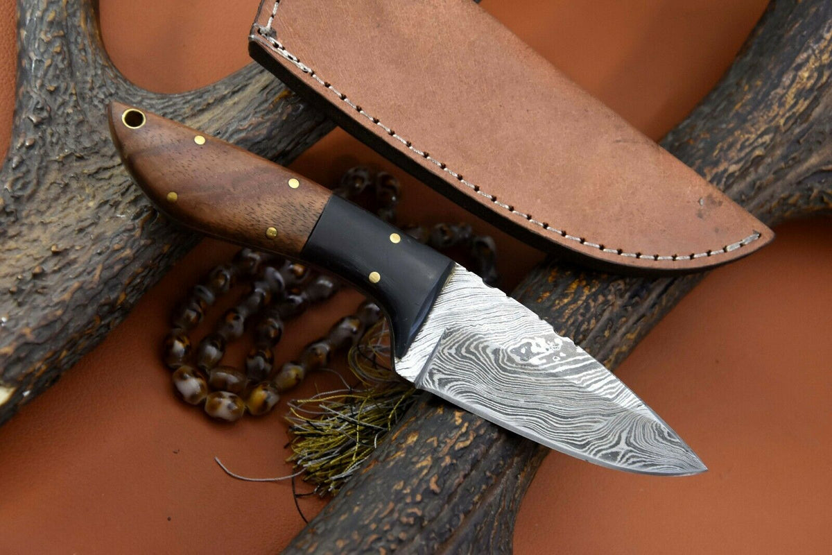 Damascus Steel Skinning Knife Featuring Walnut Wood Handle and Pakka Wood Bolster