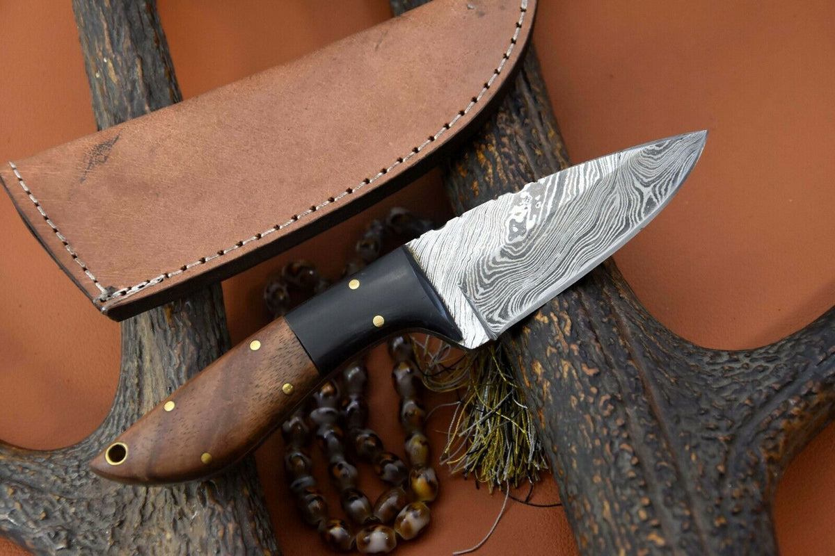 Damascus Steel Skinning Knife Featuring Walnut Wood Handle and Pakka Wood Bolster