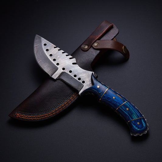 A custom handmade Damascus steel tracker knife with a blue hardwood handle With Leather sheath