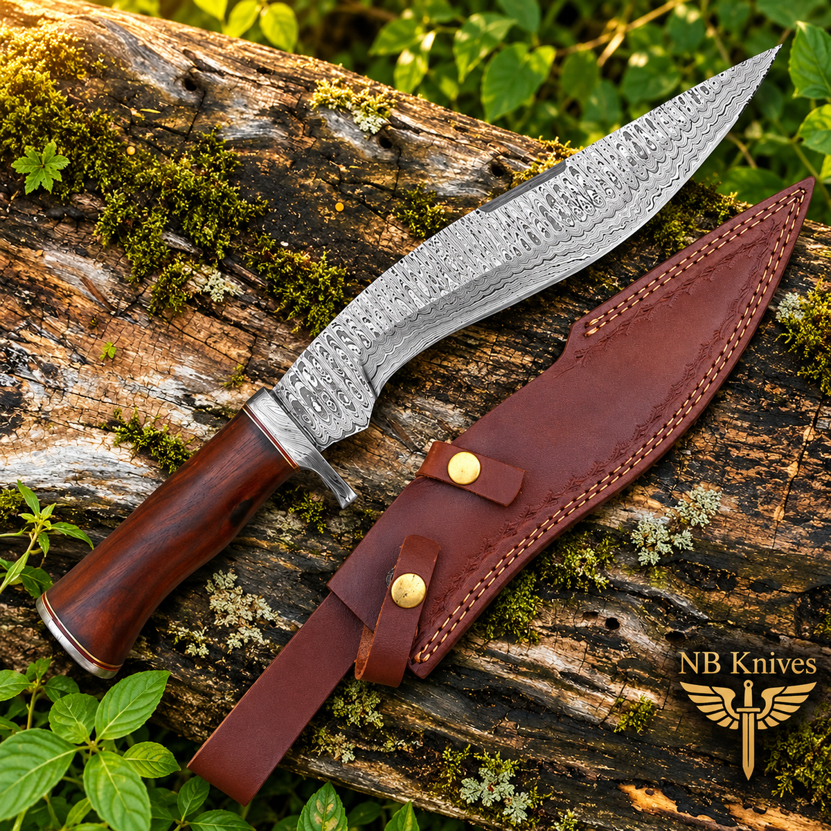 A curved knife with a patterned steel blade, dark wood handle, and brown leather sheath, arranged on a mossy log outdoors. The NB Knives logo appears in the lower right corner.