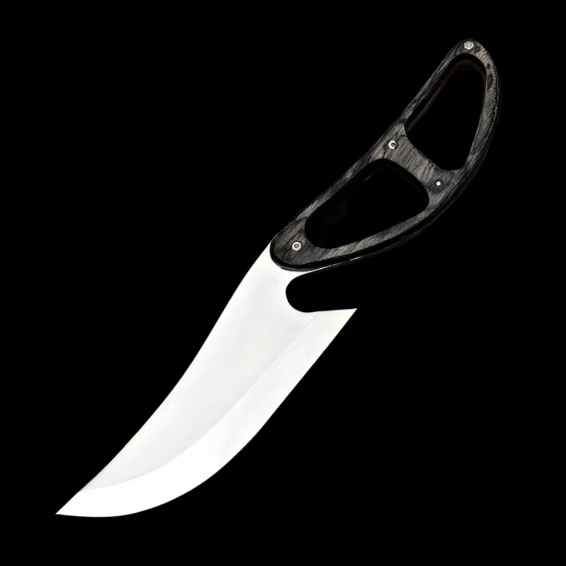 Knife with a black handle on a textured surface