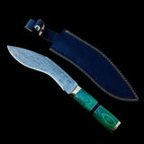 Knife with green handle and blue sheath on a wooden surface