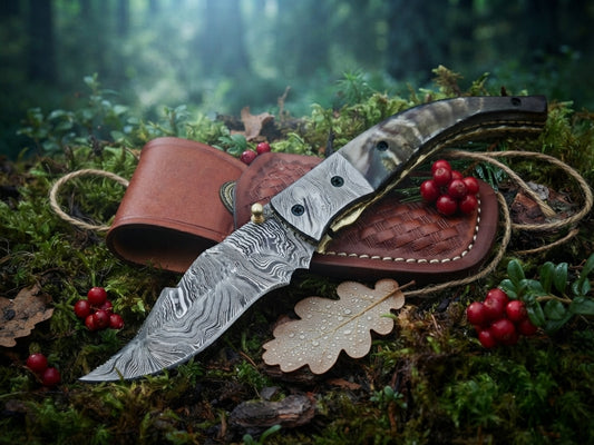Ram horn handle Damascus folding knife with leather sheath