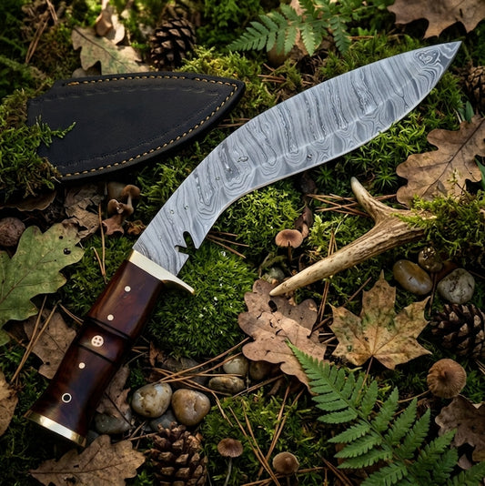 Damascus steel kukri knife blade with leather sheath in forest setting