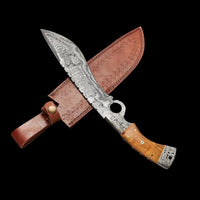 Decorative knife with wooden handle and leather sheath on a dark background