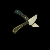 Knife with a wooden handle on a dark surface