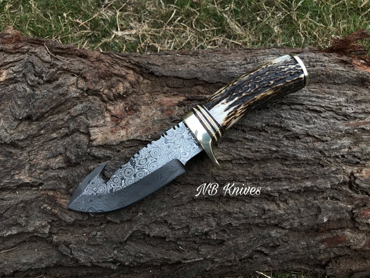 Custom handmade Damascus gut hook knife with genuine Stag Horn handle and leather sheath