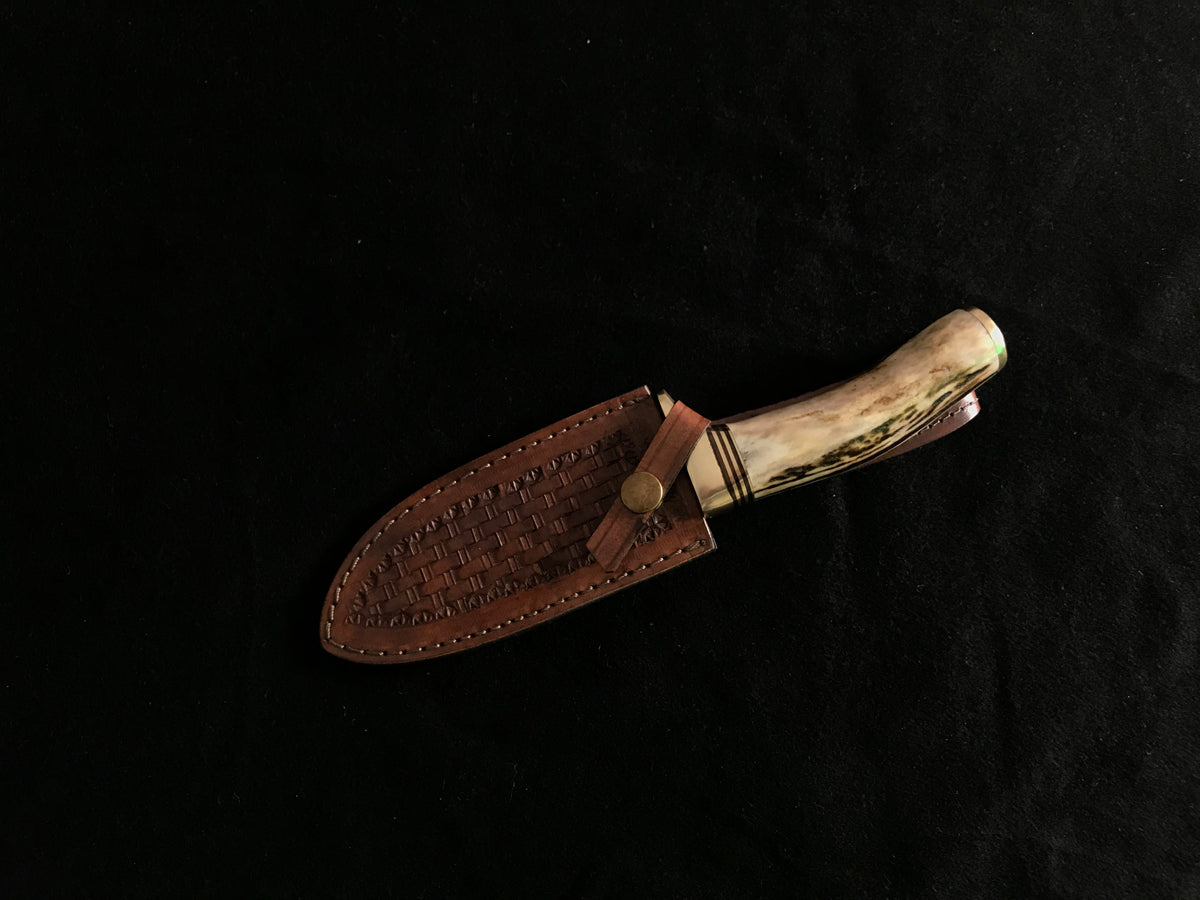 Handmade Damascus gut hook knife with stag horn handle and leather sheath