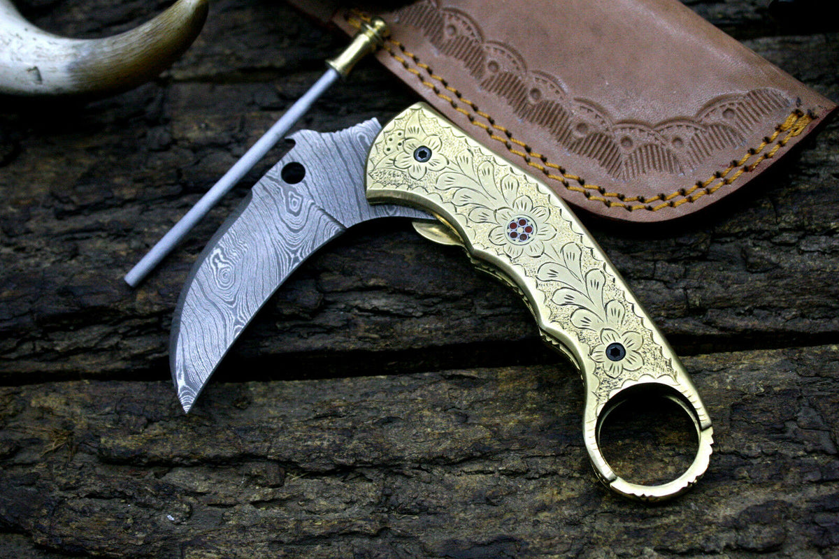 Handmade Damascus Steel Folding Knife with Engraved Brass Handle