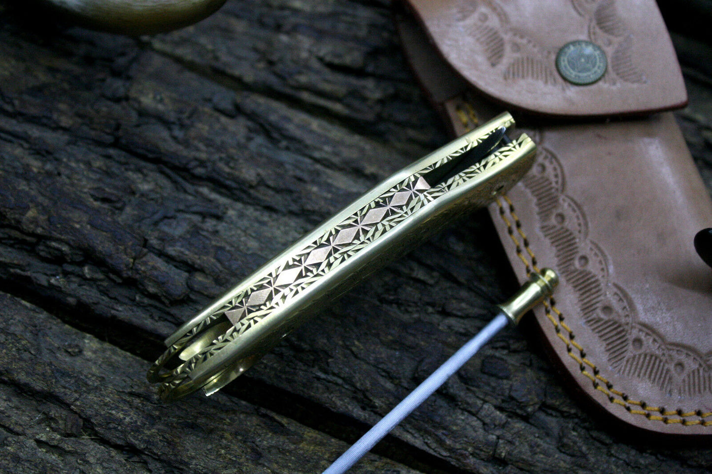 Handmade Damascus Steel Folding Knife with Engraved Brass Handle