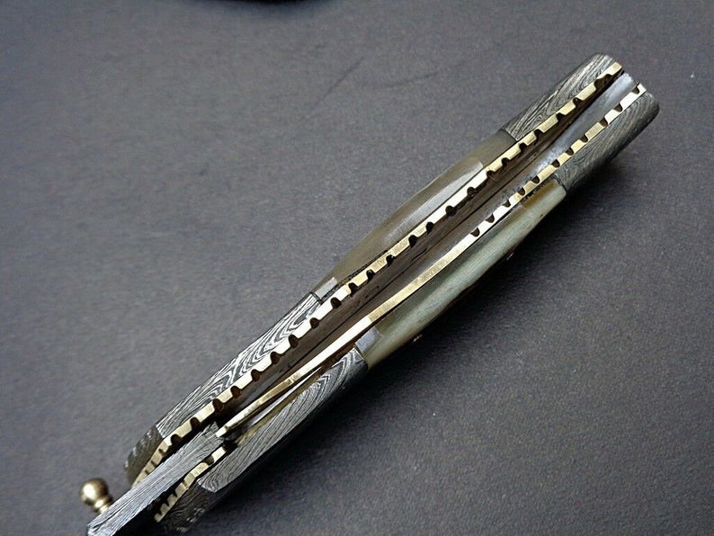 Damascus Steel Folding Knife Featuring Ram Horn Handle & Damascus Bolster