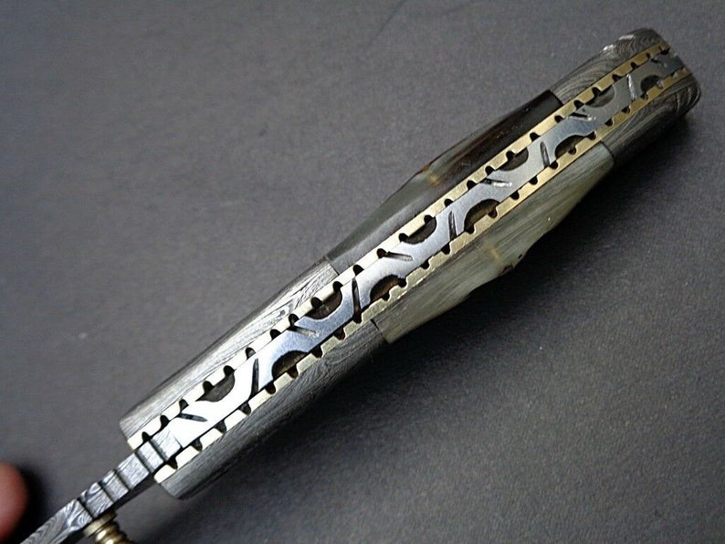 Damascus Steel Folding Knife Featuring Ram Horn Handle & Damascus Bolster