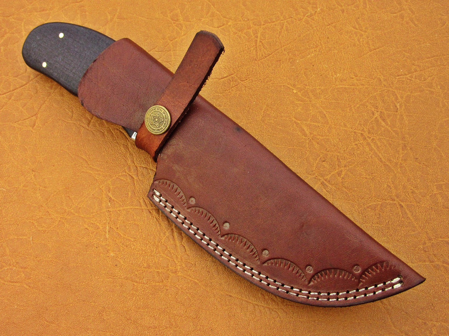 Full tang construction makes for a very solid and well balanced knife. - NB CUTLERY LTD