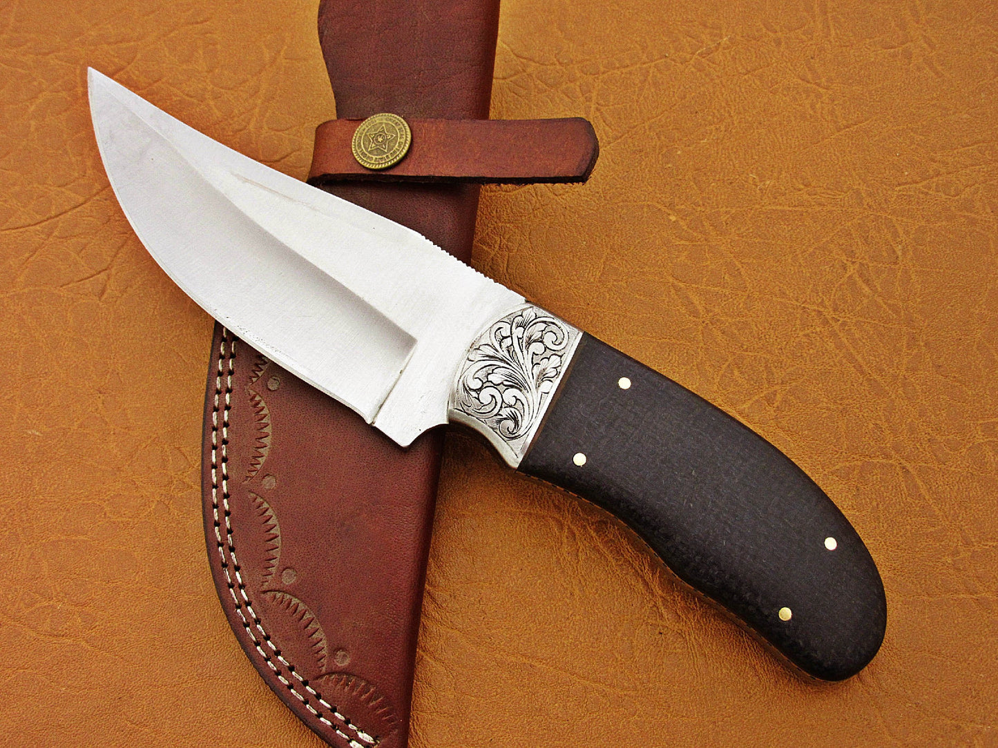Full tang construction makes for a very solid and well balanced knife. - NB CUTLERY LTD