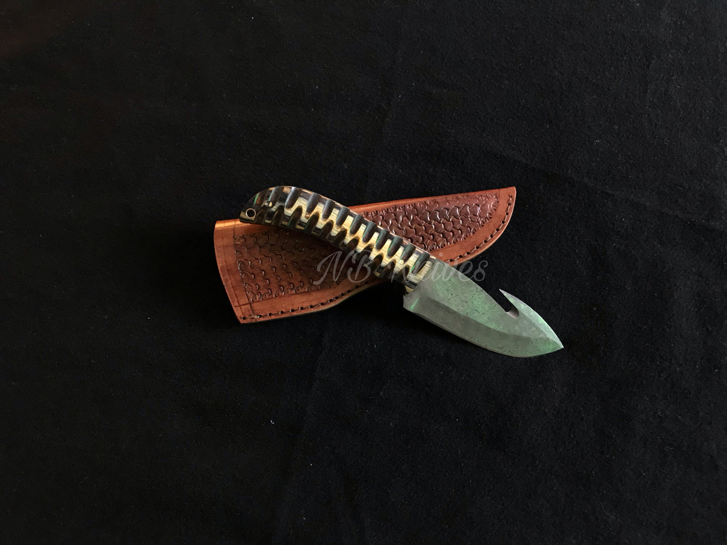 Guthook Skinning Knife Crafted from Damascus Steel