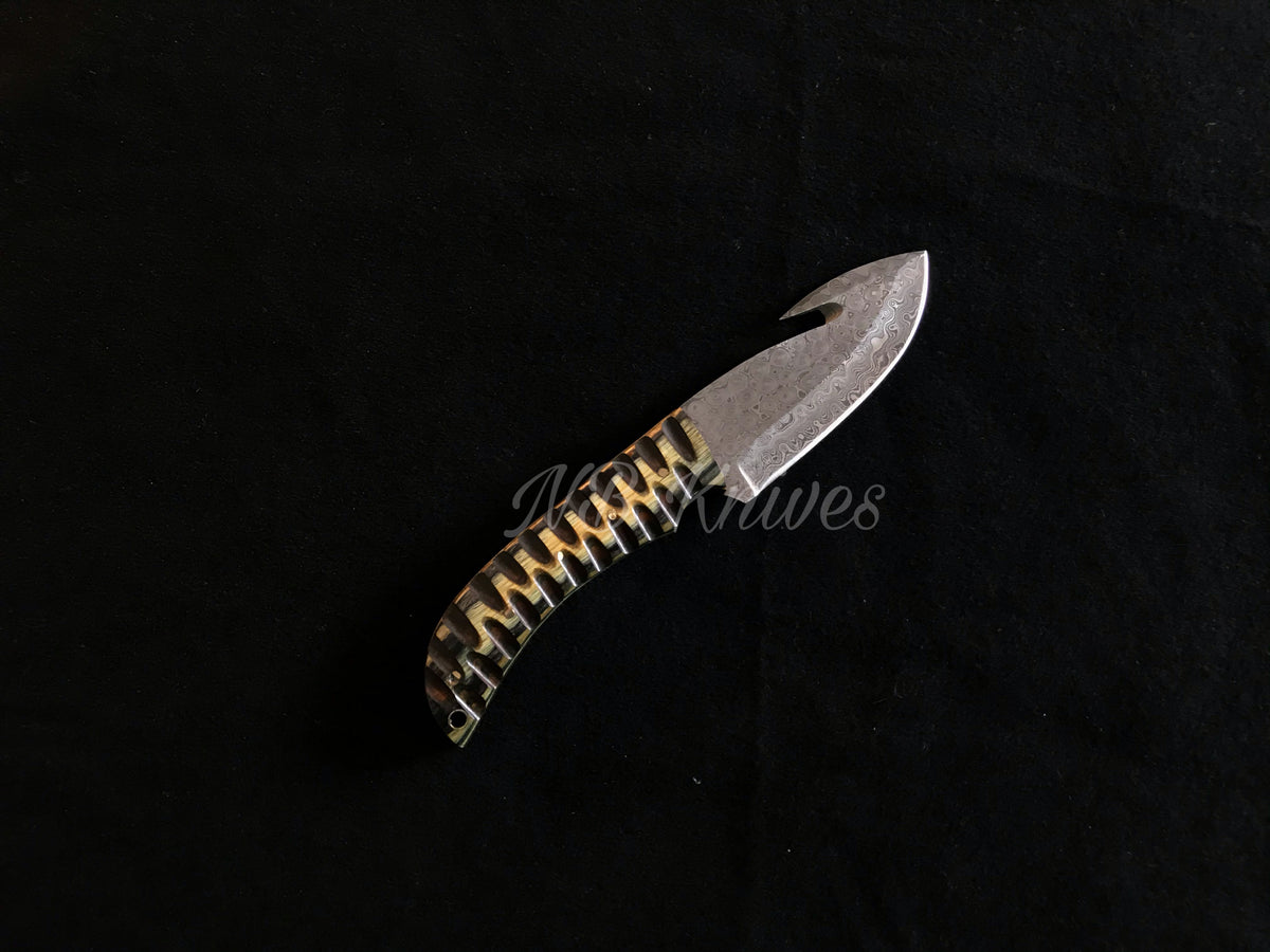 Guthook Skinning Knife Crafted from Damascus Steel
